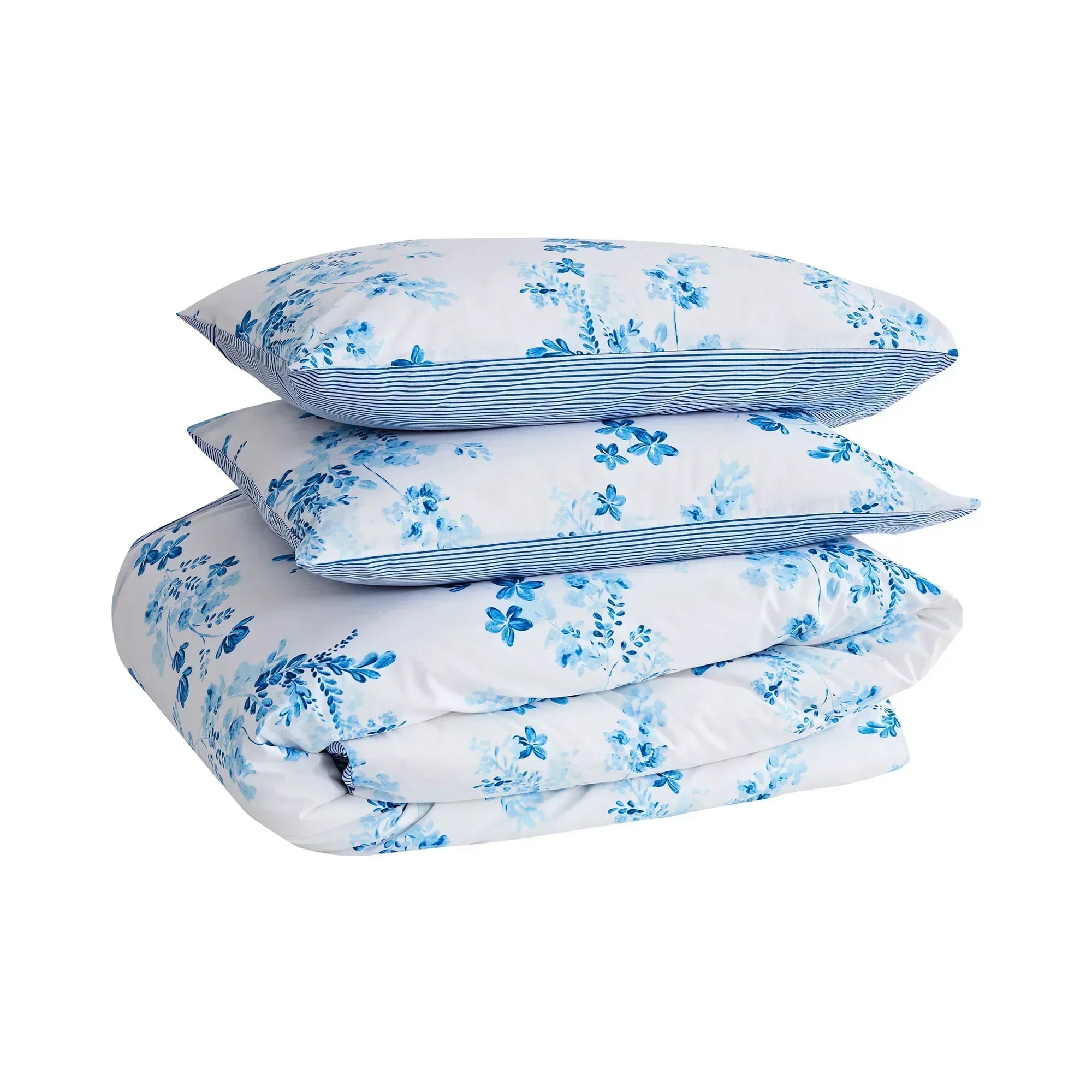 Blue floral duvet cover set with matching pillows on white background